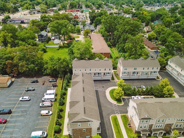 1051 N Sherman Dr Unit B19, Royal Oak, MI 48067 - aerial perspective of suburban area featuring a tree filled landscape