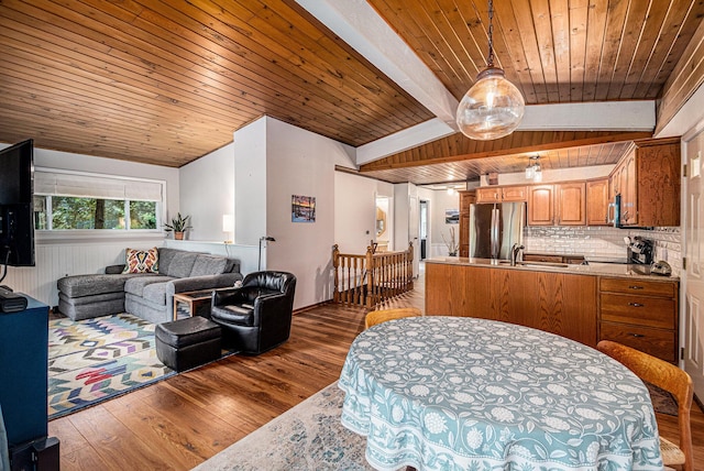 6706 E Carrigan Dr, Newaygo, MI 49337 - living area featuring wooden ceiling and dark wood-style flooring