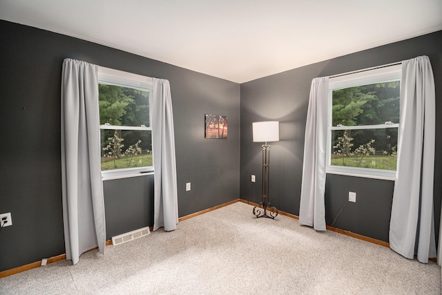6706 E Carrigan Dr, Newaygo, MI 49337 - unfurnished room featuring light carpet and baseboards