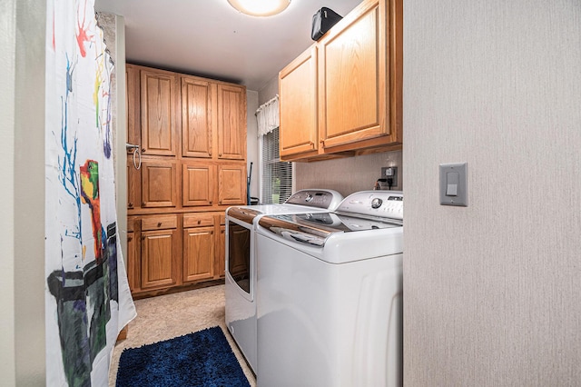 6706 E Carrigan Dr, Newaygo, MI 49337 - washroom with cabinet space, washer and clothes dryer, and light carpet