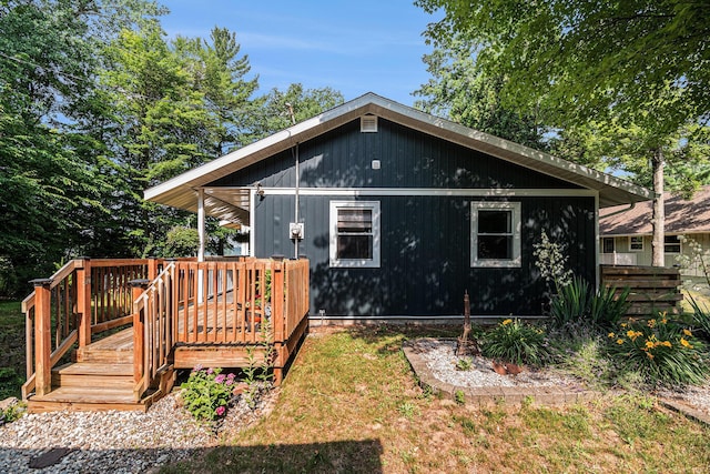 6706 E Carrigan Dr, Newaygo, MI 49337 - back of house featuring a wooden deck