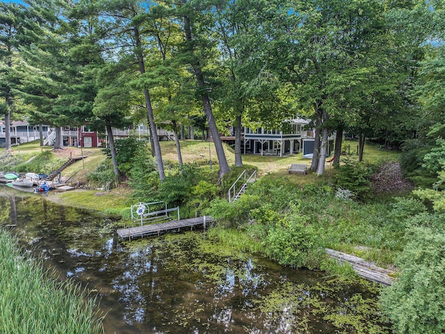 6706 E Carrigan Dr, Newaygo, MI 49337 - dock area featuring stairway and a water view