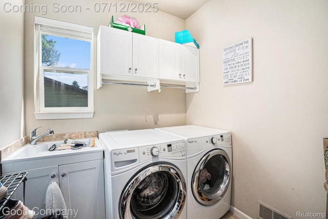 2920 Hartline Dr, Rochester Hills, MI 48309 - washroom featuring cabinet space and washing machine and dryer