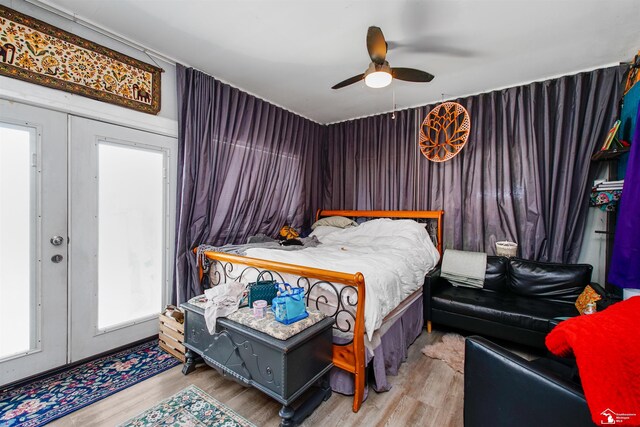 8124 Bailey St, Taylor, MI 48101 - bedroom featuring wood finished floors, ceiling fan, and french doors