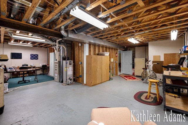 9650 Killdeer Ct, Canadian Lakes, MI 49346 - unfinished below grade area with gas water heater, concrete block wall, and white fridge