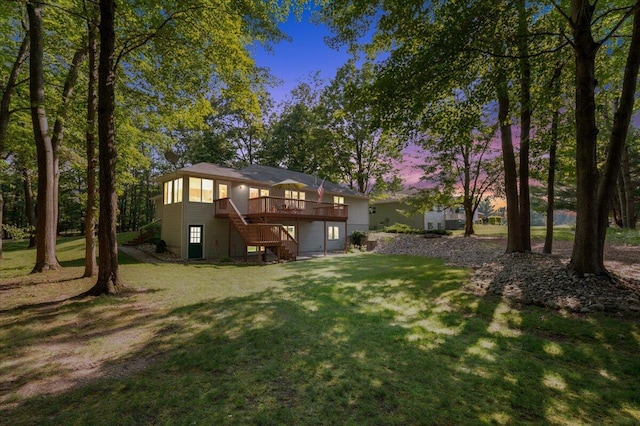 9650 Killdeer Ct, Canadian Lakes, MI 49346 - view of grassy yard with stairway and a wooden deck