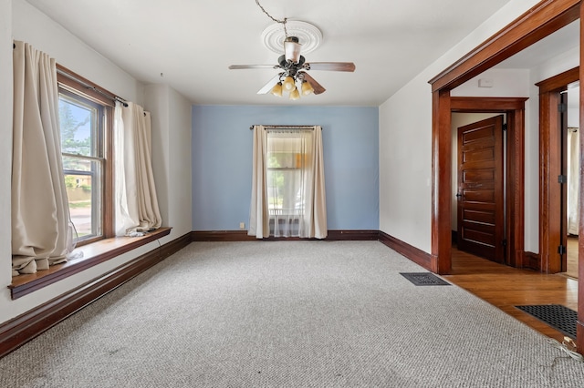 1310 Washington Ave, Kalamazoo, MI 49001 - unfurnished room with ceiling fan and carpet