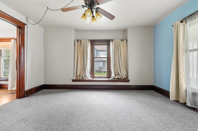 1310 Washington Ave, Kalamazoo, MI 49001 - unfurnished room with carpet and a ceiling fan