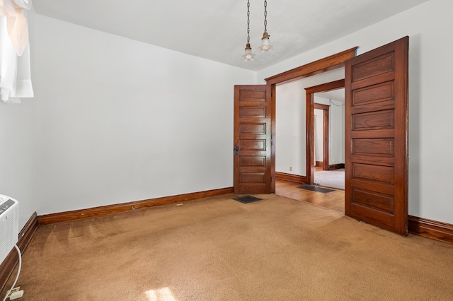 1310 Washington Ave, Kalamazoo, MI 49001 - spare room with light carpet