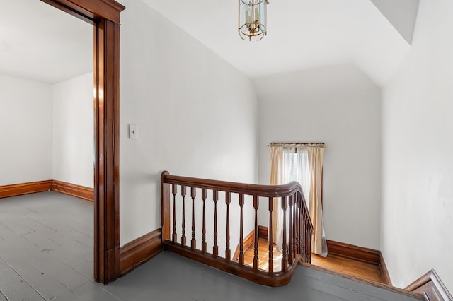 1310 Washington Ave, Kalamazoo, MI 49001 - stairs with baseboards and vaulted ceiling