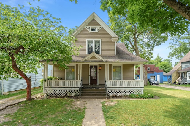 1310 Washington Ave, Kalamazoo, MI 49001 - view of front of property with a front lawn and covered porch