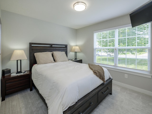 3740 Pristine Ave, Kalamazoo, MI 49048 - bedroom featuring baseboards and light carpet