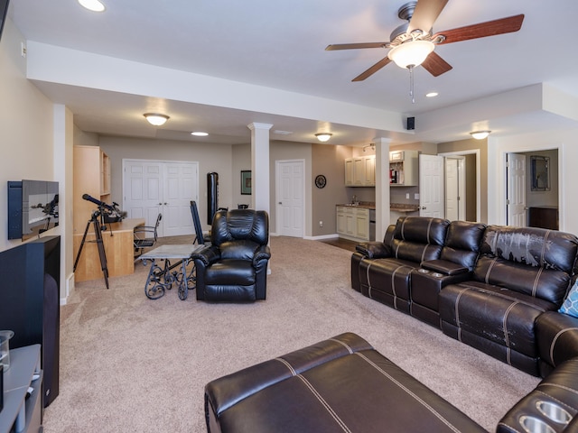 3740 Pristine Ave, Kalamazoo, MI 49048 - living area with carpet flooring, recessed lighting, a ceiling fan, and ornate columns
