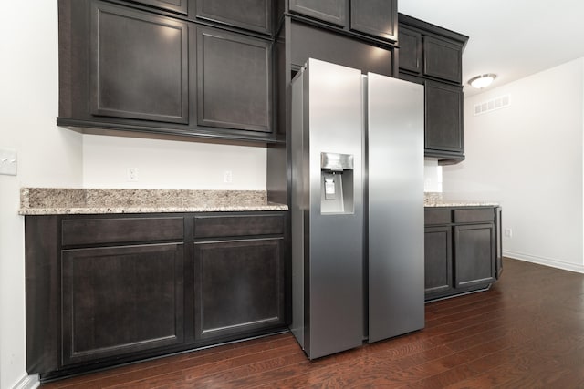4215 Chandi Ct, Ypsilanti, MI 48197 - kitchen featuring stainless steel fridge, dark wood-style floors, and light stone countertops