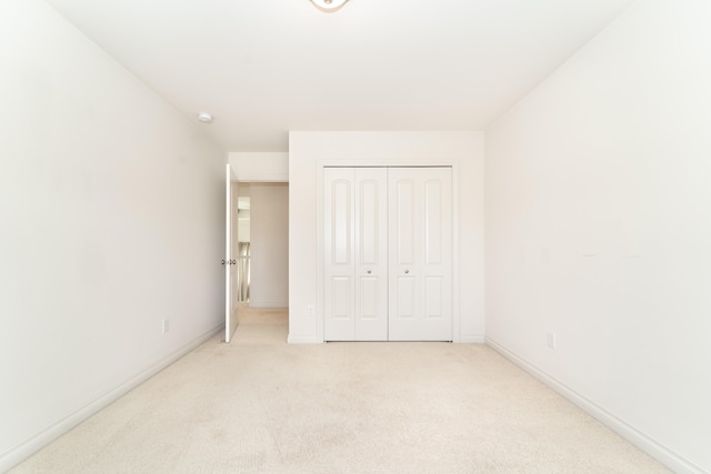 4215 Chandi Ct, Ypsilanti, MI 48197 - unfurnished bedroom featuring light carpet and a closet