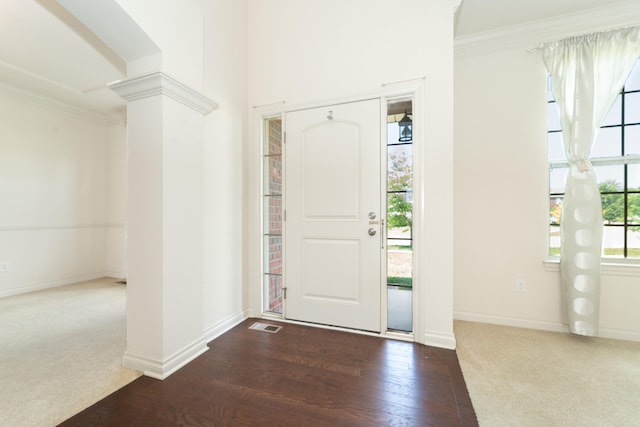 4215 Chandi Ct, Ypsilanti, MI 48197 - entryway featuring crown molding, carpet floors, wood finished floors, and ornate columns