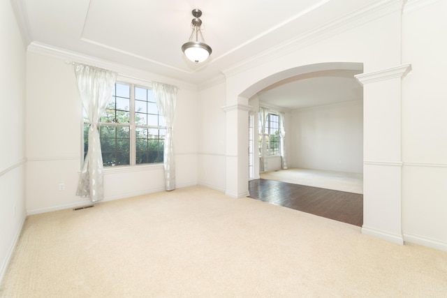 4215 Chandi Ct, Ypsilanti, MI 48197 - carpeted empty room with arched walkways, ornamental molding, healthy amount of natural light, and decorative columns