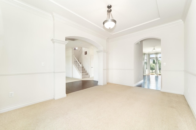 4215 Chandi Ct, Ypsilanti, MI 48197 - carpeted spare room with arched walkways, ornamental molding, stairs, and ornate columns