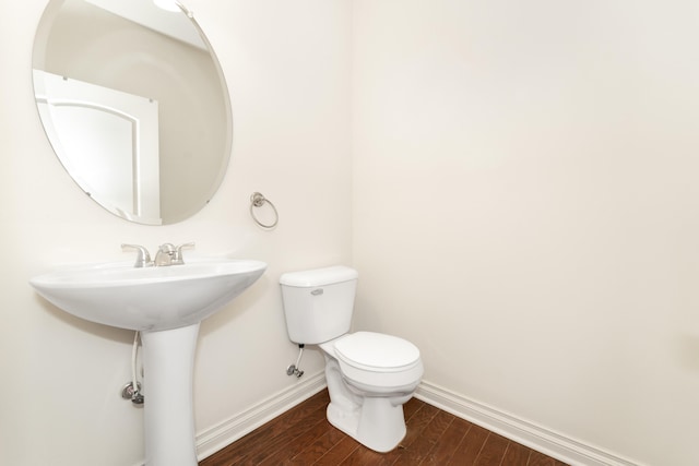 4215 Chandi Ct, Ypsilanti, MI 48197 - bathroom with baseboards and wood finished floors
