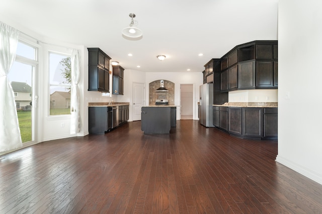 4215 Chandi Ct, Ypsilanti, MI 48197 - kitchen with freestanding refrigerator, plenty of natural light, dark wood finished floors, and recessed lighting