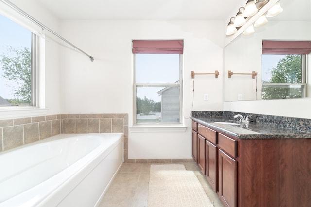 4215 Chandi Ct, Ypsilanti, MI 48197 - full bath with vanity, a bath, and tile patterned flooring
