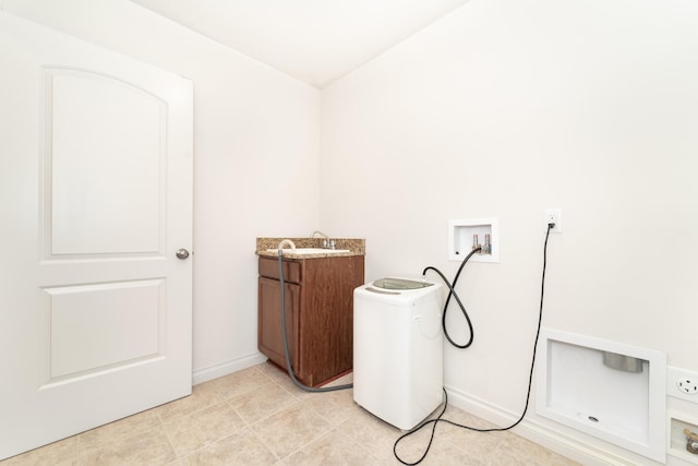 4215 Chandi Ct, Ypsilanti, MI 48197 - laundry room with hookup for a washing machine, cabinet space, and light tile patterned floors