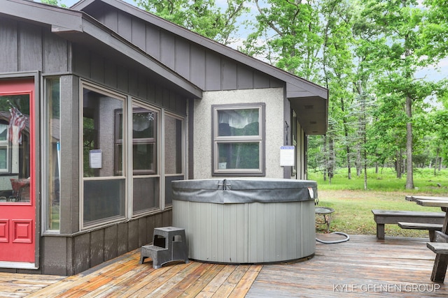 9228 S Star Lake Dr, Baldwin, MI 49304 - wooden terrace with a hot tub