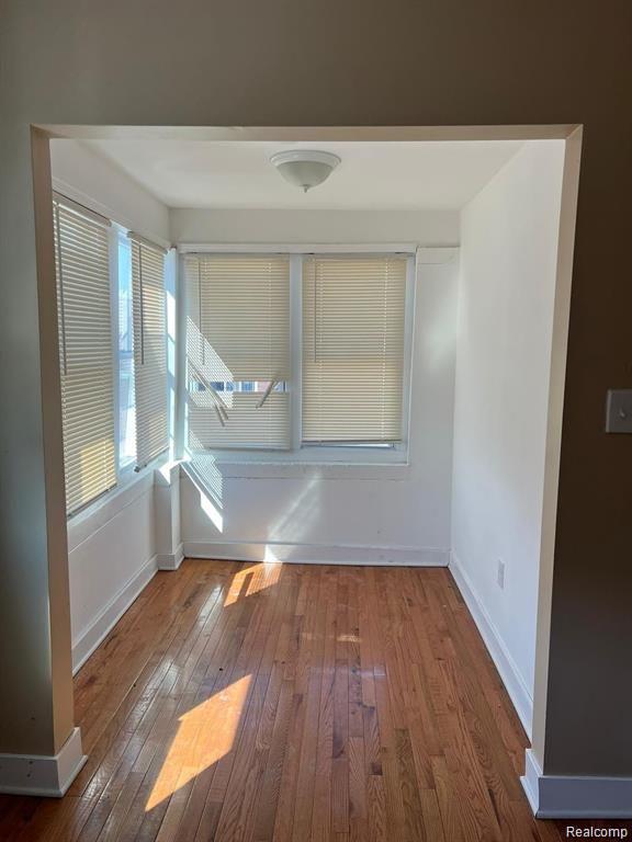 6349 Barlum St, Detroit, MI 48210 - empty room featuring hardwood / wood-style floors