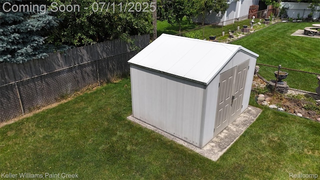36819 Maas Dr, Sterling Heights, MI 48312 - view of shed with a fenced backyard