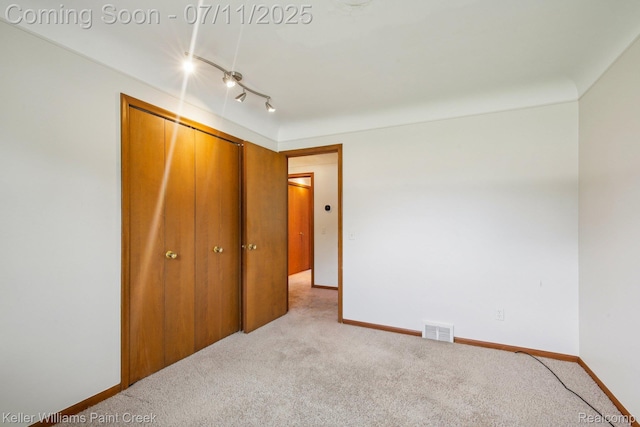 36819 Maas Dr, Sterling Heights, MI 48312 - unfurnished bedroom with light carpet and a closet