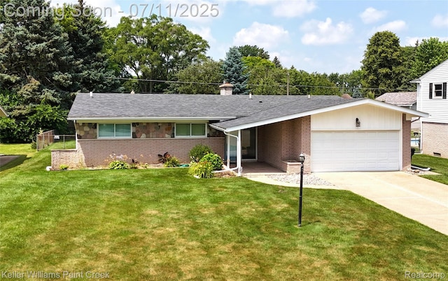 36819 Maas Dr, Sterling Heights, MI 48312 - view of front facade with a garage, brick siding, driveway, and a front yard