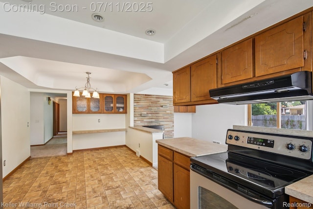 36819 Maas Dr, Sterling Heights, MI 48312 - kitchen with stainless steel electric stove, extractor fan, a tray ceiling, brown cabinets, and a chandelier