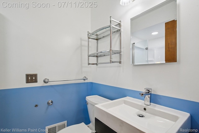 36819 Maas Dr, Sterling Heights, MI 48312 - bathroom with toilet and vanity