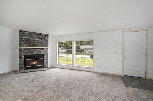 13114 Brockway Blvd, Vicksburg, MI 49097 - unfurnished living room featuring carpet floors, a fireplace, and lofted ceiling