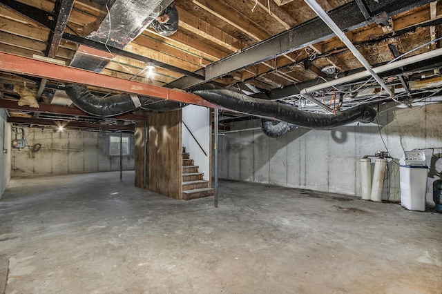 13114 Brockway Blvd, Vicksburg, MI 49097 - unfinished basement featuring stairs and a water softener system
