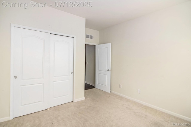 4104 Ashdale Way, Clarkston, MI 48348 - unfurnished bedroom featuring light colored carpet and a closet