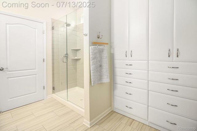 4104 Ashdale Way, Clarkston, MI 48348 - bathroom featuring a shower stall and baseboards