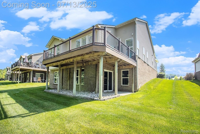 4104 Ashdale Way, Clarkston, MI 48348 - back of house with brick siding, a lawn, and a deck