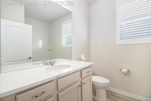 4104 Ashdale Way, Clarkston, MI 48348 - bathroom featuring toilet and vanity
