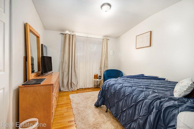 8477 Church Rd, Grosse Ile, MI 48138 - bedroom with light wood-style flooring