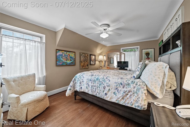 115 Illinois Ave, Pontiac, MI 48341 - bedroom featuring wood finished floors, arched walkways, and a ceiling fan
