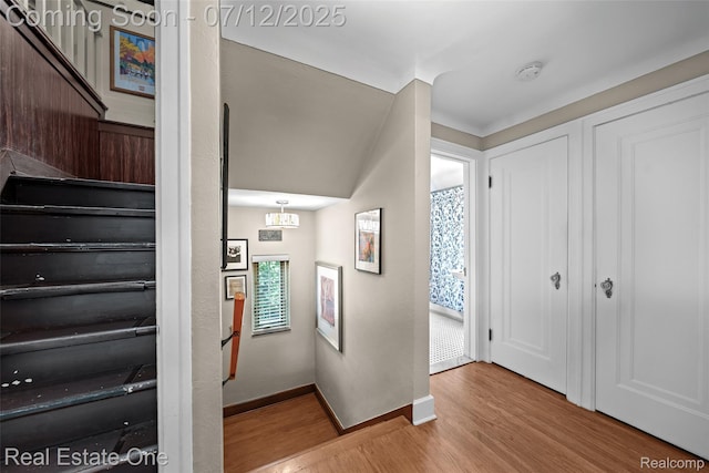 115 Illinois Ave, Pontiac, MI 48341 - entrance foyer with wood finished floors, plenty of natural light, and a chandelier