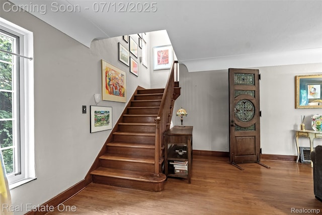 115 Illinois Ave, Pontiac, MI 48341 - staircase featuring wood finished floors and baseboards