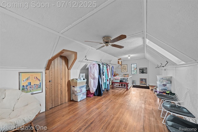 115 Illinois Ave, Pontiac, MI 48341 - bonus room with ceiling fan, a textured ceiling, hardwood / wood-style floors, and lofted ceiling