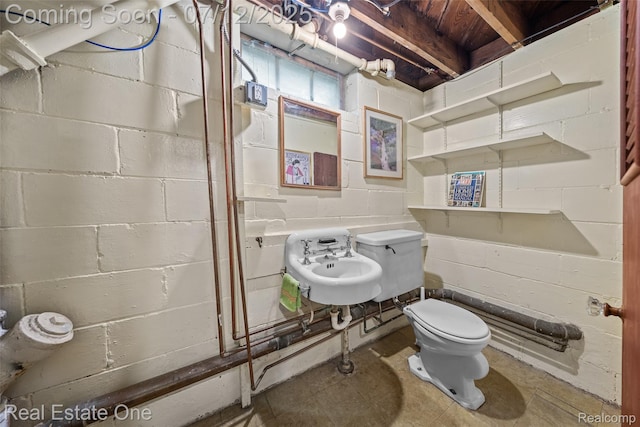 115 Illinois Ave, Pontiac, MI 48341 - half bath featuring toilet and concrete block wall