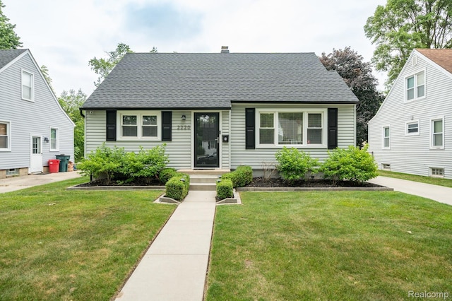2220 Cummings Ave, Berkley, MI 48072 - cape cod home with a front lawn, a chimney, and a shingled roof