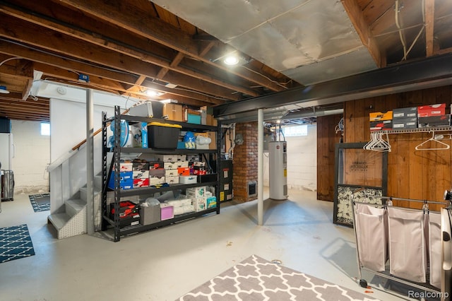 2220 Cummings Ave, Berkley, MI 48072 - basement with water heater, wooden walls, and stairway