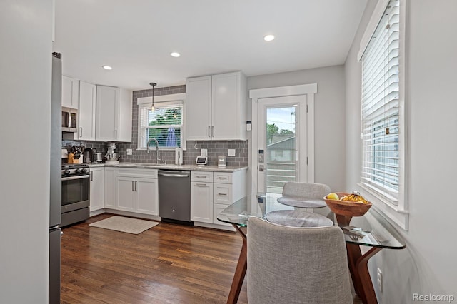 2220 Cummings Ave, Berkley, MI 48072 - kitchen featuring stainless steel appliances, tasteful backsplash, white cabinetry, and recessed lighting