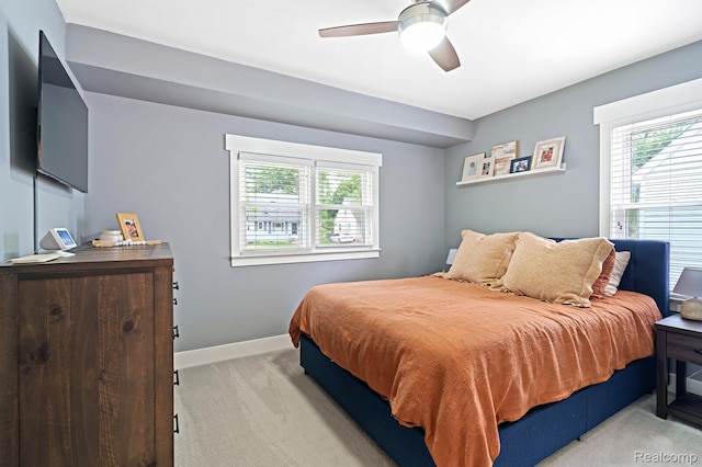 2220 Cummings Ave, Berkley, MI 48072 - bedroom with light colored carpet, multiple windows, and a ceiling fan