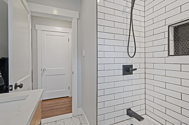 2220 Cummings Ave, Berkley, MI 48072 - bathroom with a tile shower and vanity